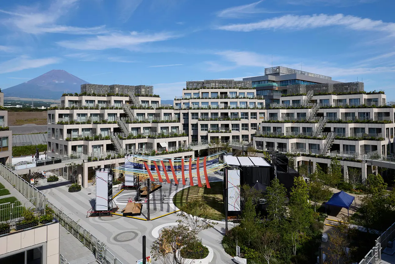 Aerial view of Woven City showcasing interconnected urban design and infrastructure